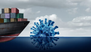 Ship with containers approaching an illustration of a virus floating in the ocean like an iceberg